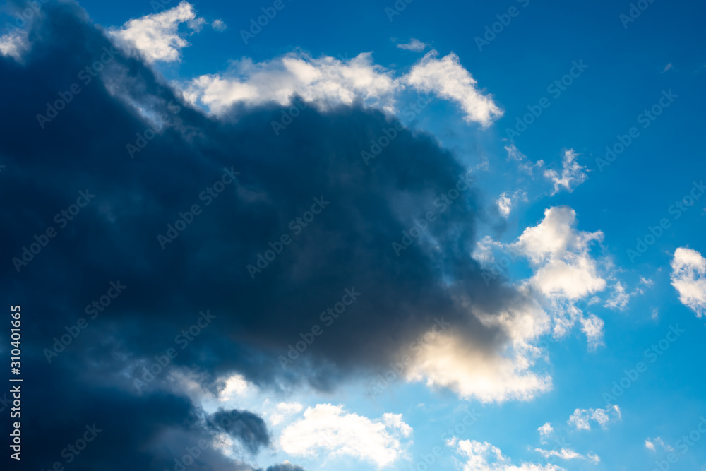 Blue sky with black clouds. Blue sky with white clouds Blue sky with black clouds. Blue sky with white clouds