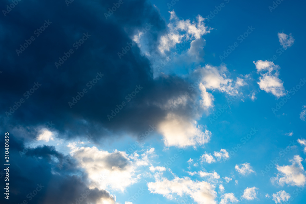 Blue sky with black clouds. Blue sky with white clouds Blue sky with black clouds. Blue sky with white clouds