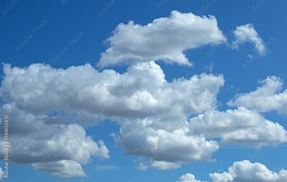 wallpaper of white fluffy clouds in the blue sky wallpaper of white fluffy clouds in the blue sky