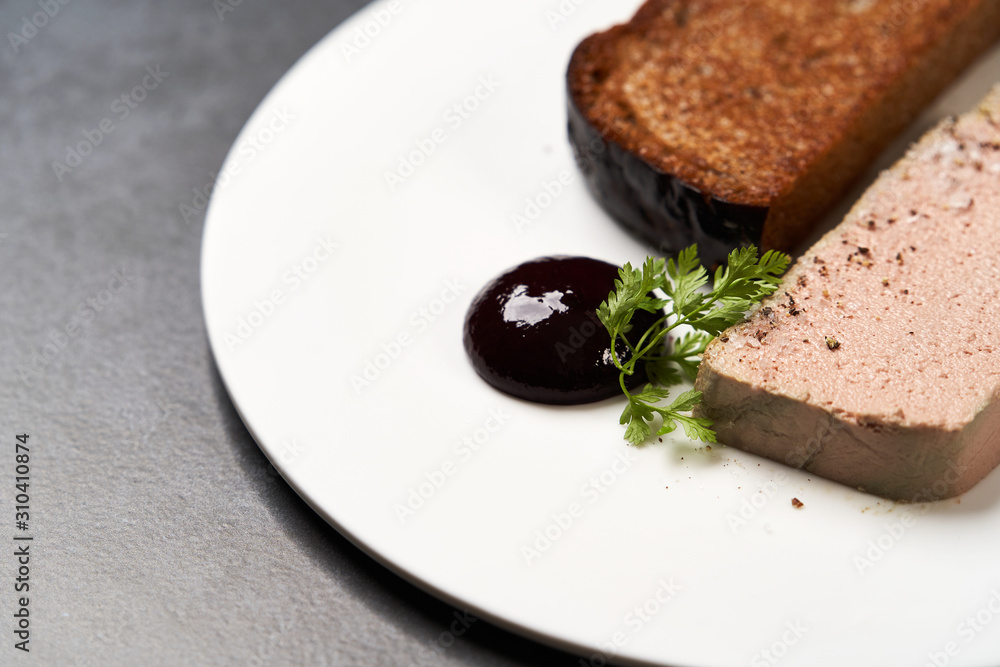 Chicken liver pate with blackcurrant,fig sauce and toasted bread Chicken liver pate with blackcurrant,fig sauce and toasted bread