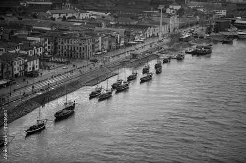 Portugal, Porto, January 16, 2019, view of the city from the Don Luis bridge, black and white photo of ships from above