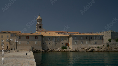 a beautiful view of the town of krk on the shores of the Adriatic Sea