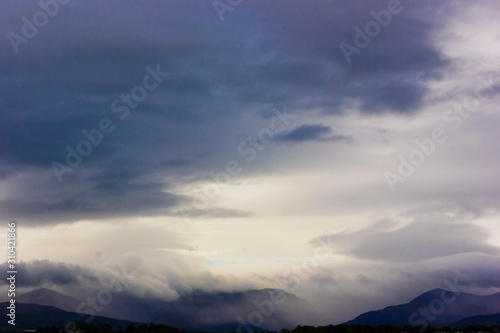 Striking view of heavy precipitation over the Snowdonia Mountain range © Liberty Photo Art