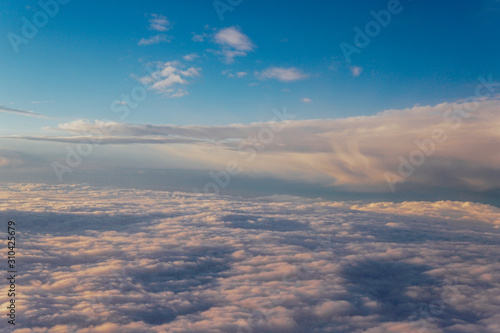 Wallpaper Mural Sky with clouds at sunset from inside the plane landscape Torontodigital.ca