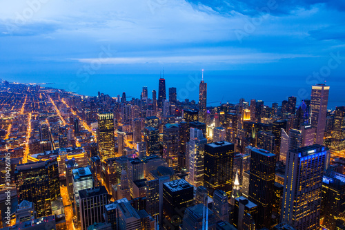 Chicago night skyline, city lights, dark blue sky after the dusk