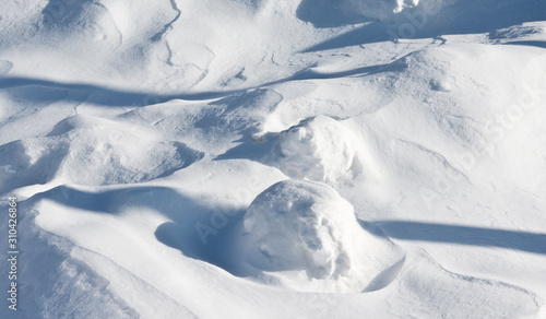 Fresh snow cover in dunes at closeup/ Winter landscape