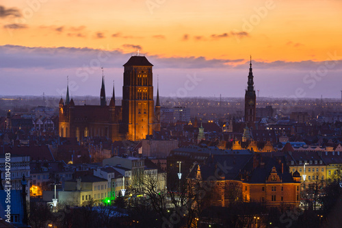 Beautiful cityscape of Gdansk with St. Mary Basilica and City Hall at dawn, Poland.