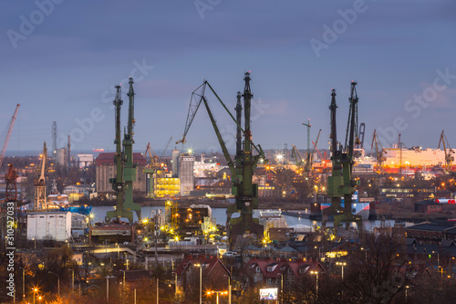 Cranes of the shipyard in Gdansk at dawn, Poland