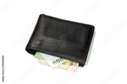 brown leather wallet with thai banknotes on white background.