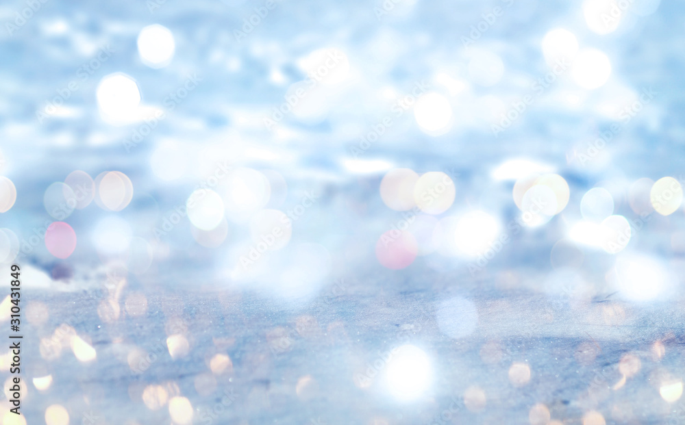 Abstract background. Defocused lights of the night city. Brilliant festive background with neon glow. Abstract background. Defocused lights of the night city. Brilliant festive background with neon glow.