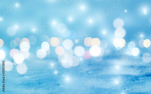 Abstract background. Defocused lights of the night city. Brilliant festive background with neon glow.