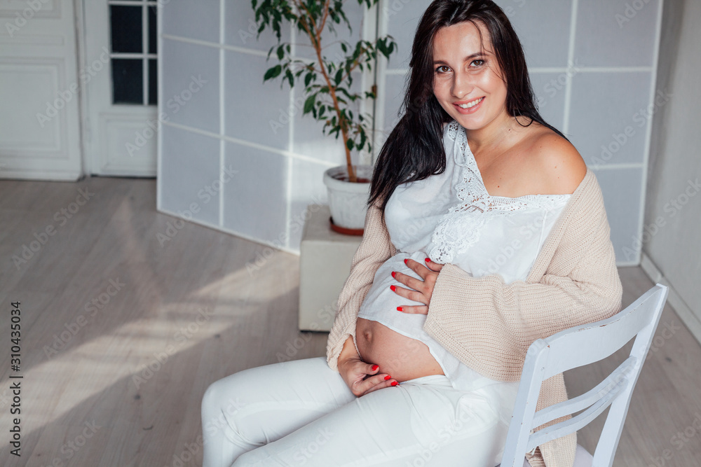 Portrait of beautiful pregnant woman before childbirth family