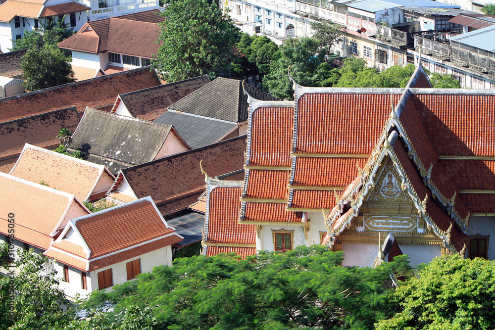Houses in the city center, near the temple of the Golden mountain, Wat Saket in Bangkok, Thailand. Houses in the city center, near the temple of the Golden mountain, Wat Saket in Bangkok, Thailand.
