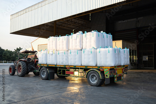 Jumbo bags white colour arranged on the truck Inside rice packaging.