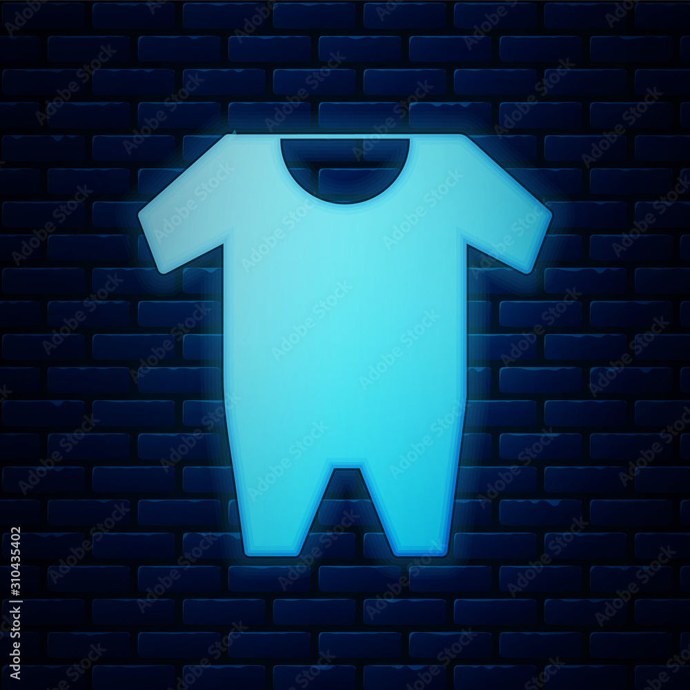 Glowing neon Baby clothes icon isolated on brick wall background