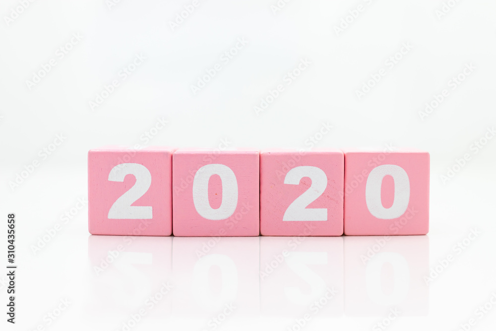 Fototapeta premium Pink wooden block number 2020. Image use for background happy new year, fresh ,business concept.