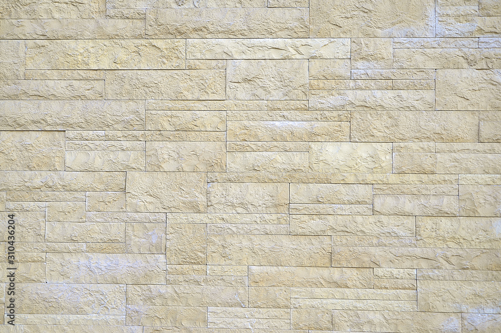 Fototapeta premium Old beige mosaic stone texture