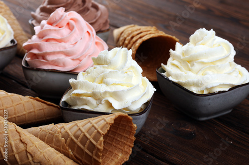 soft ice cream in flavor vanilla, chocolate and strawberry. Delicous creamy refreshing ice cream