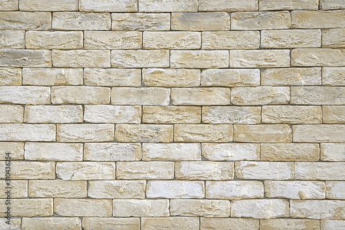 Old beige brick wall texture