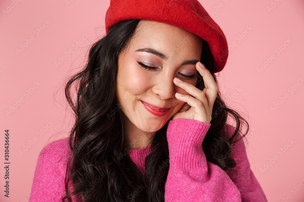 Image of shy beautiful asian girl with long dark hair in beret smiling Image of shy beautiful asian girl with long dark hair in beret smiling