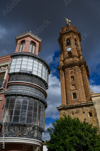Clock tower of San Sebastian Church against blue sky, Antequera, M�laga, Spain