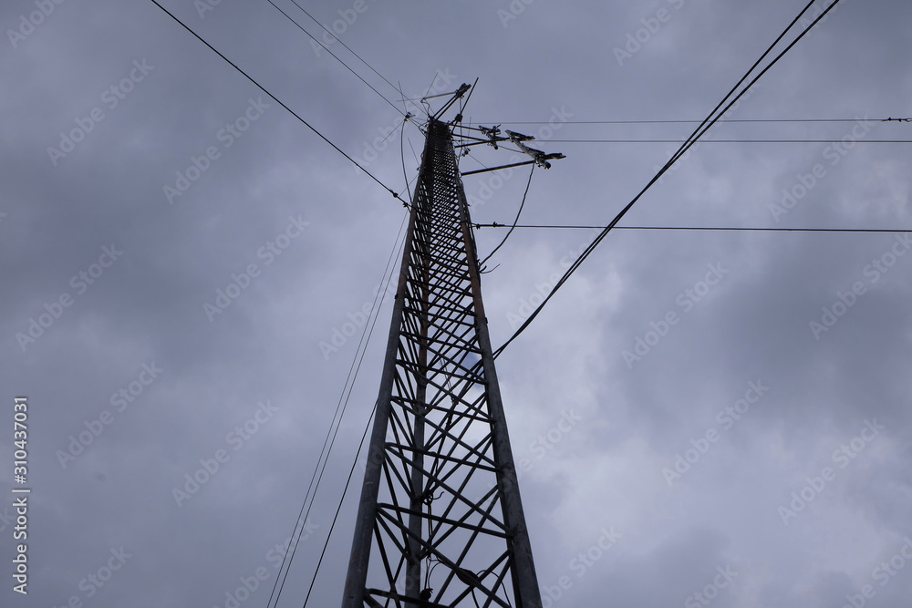 electricity pylon against blue sky electricity pylon against blue sky