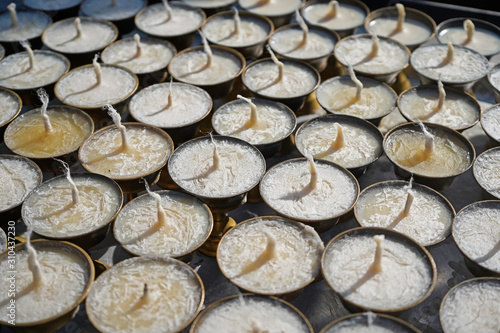 New unlit butter lamps in the temple, Kathmandu, Nepal 