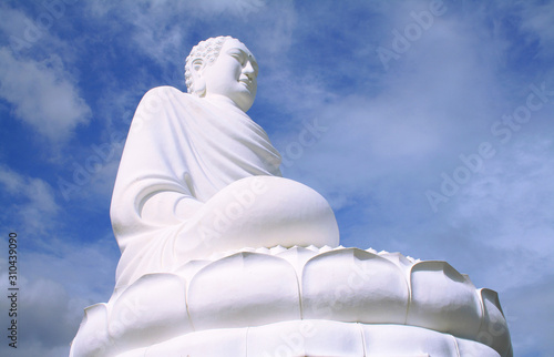 5 December 2019-Nha Trang, Vietnam. A giant sculpture of a seated Buddha in the Long Shon pagoda.