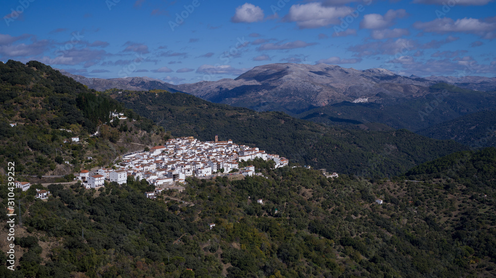 Aerial view of houses in a town, El Mirador Del Genal, Malaga Province, Spain