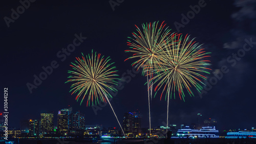 New Year's celebration fireworks in night city in Pattaya, Thailand. © Anek