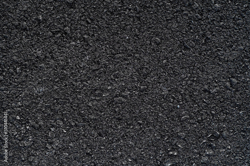 Asphalt texture rough road, Tarmac dark grey grainy, Seamless background, Top view