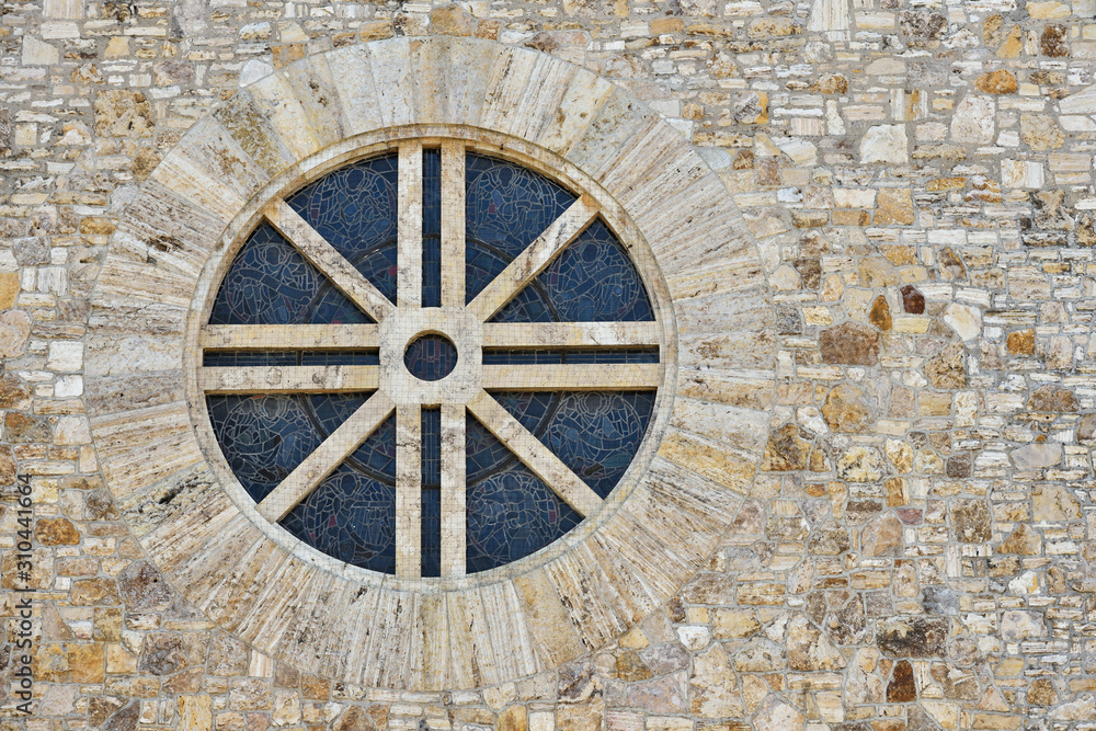 Large window wheel close-up at the church the heart of Jesus in the European city of Pforzheim in Germany