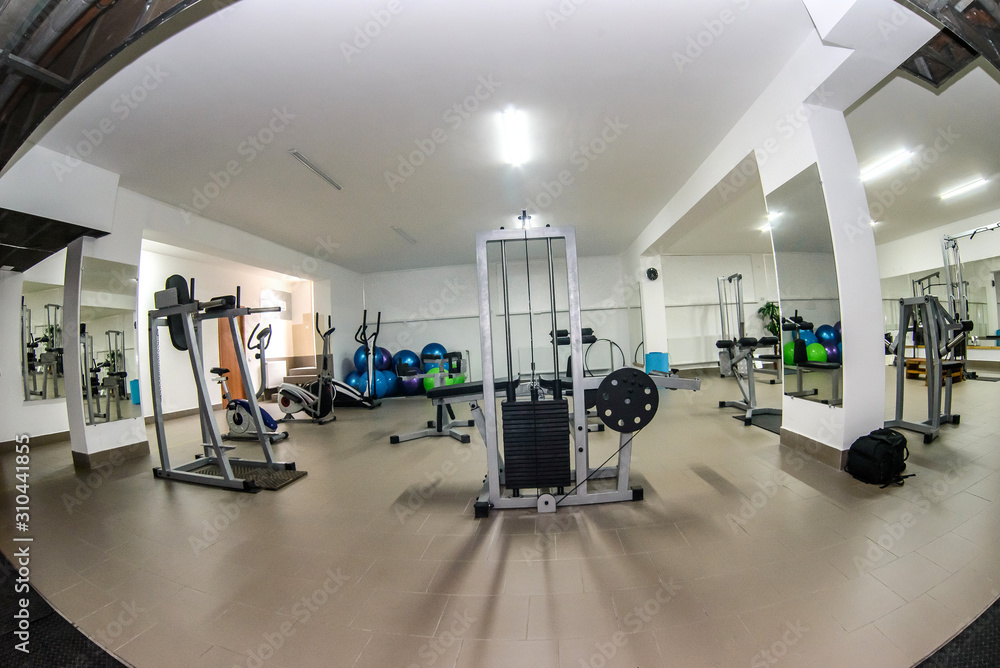 Fish-eye effect on modern and light gym equipment Fish-eye effect on modern and light gym equipment