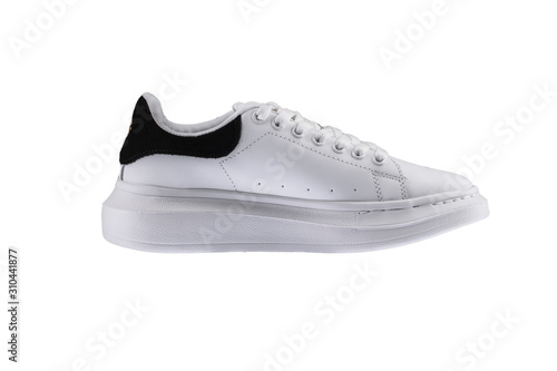 Sport shoes. White sneaker with a black insert on a white background.