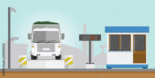 Dangerous garbage truck on the weighing scale at the checkpoint. Before and after transport operations. Beside with CCTV Camera.