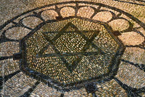 The Star of David mozaic on flooring in Cordoba Synagogue, District Centro, C�rdoba, C�rdoba Province, Spain
