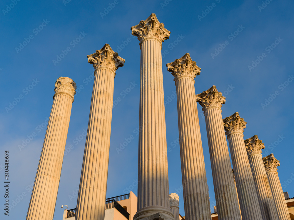 Low angle view of Columns of Roman Temple, Cordoba, Andalusia, Spain Low angle view of Columns of Roman Temple, Cordoba, Andalusia, Spain