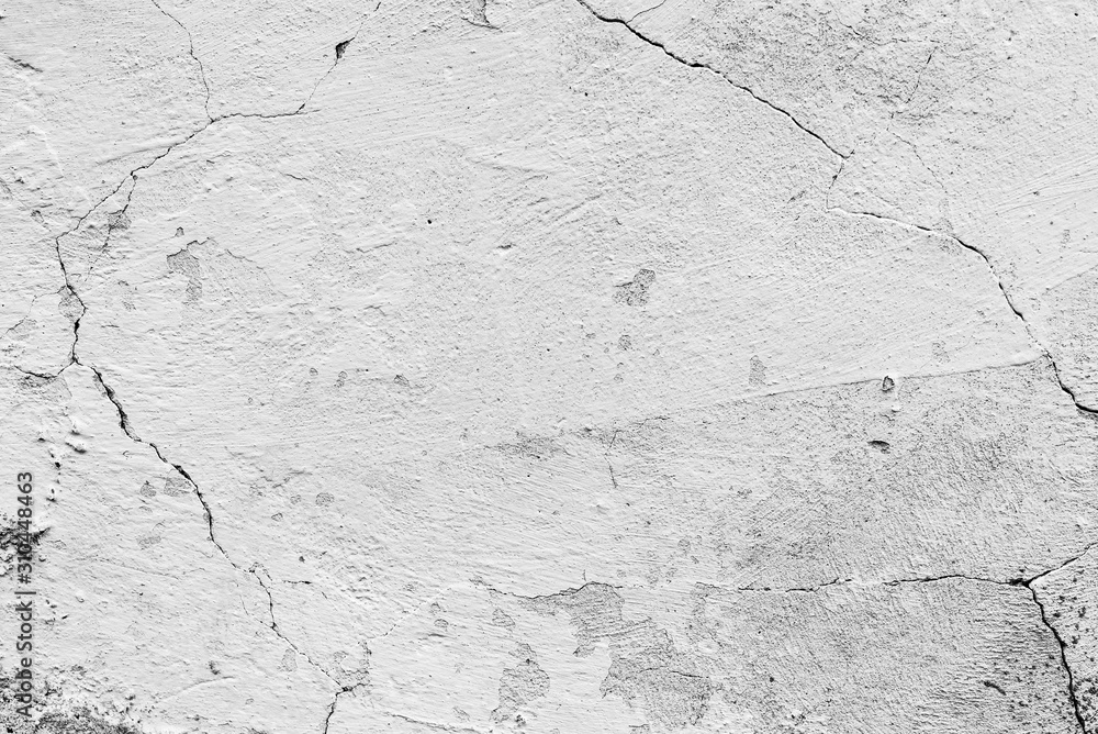 Obraz premium Texture of a concrete wall with cracks and scratches which can be used as a background
