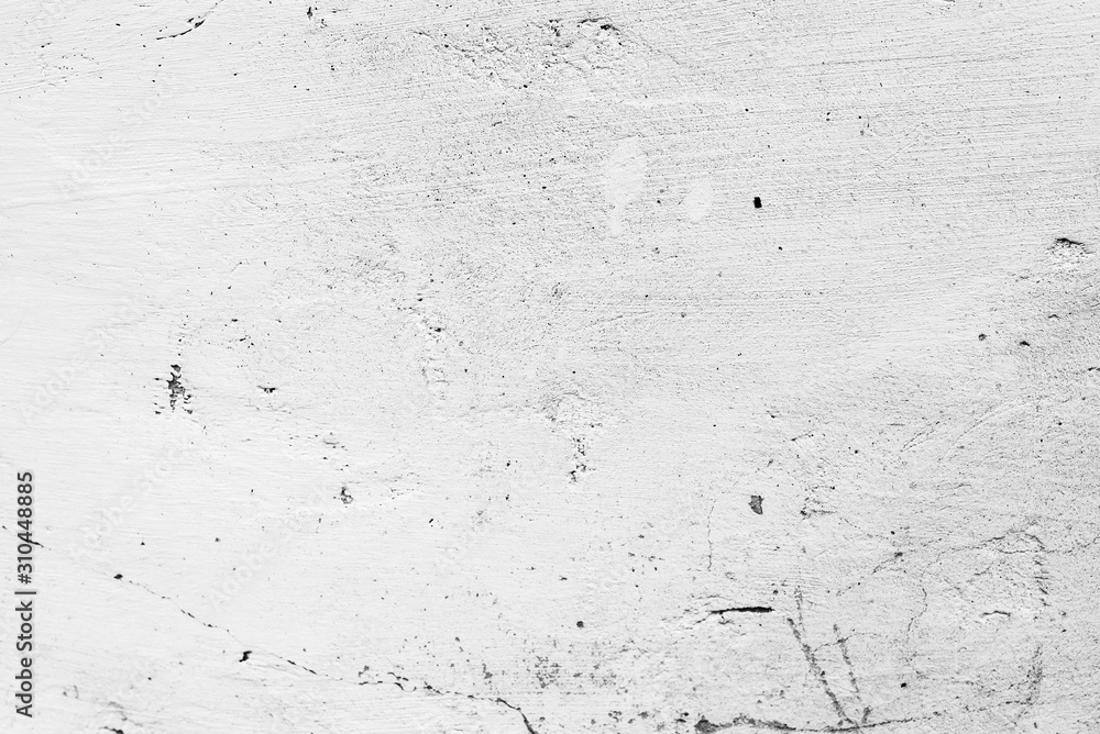 Texture of a concrete wall with cracks and scratches which can be used as a background Texture of a concrete wall with cracks and scratches which can be used as a background