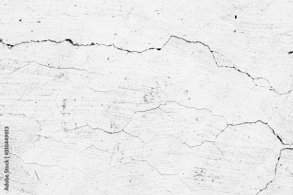 Texture of a concrete wall with cracks and scratches which can be used as a background Texture of a concrete wall with cracks and scratches which can be used as a background