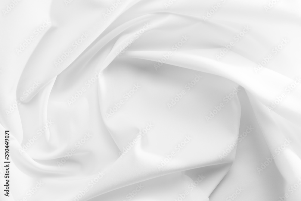 Abstract white fabric texture background. Cloth soft wave. Creases of satin, silk, and cotton. Abstract white fabric texture background. Cloth soft wave. Creases of satin, silk, and cotton.