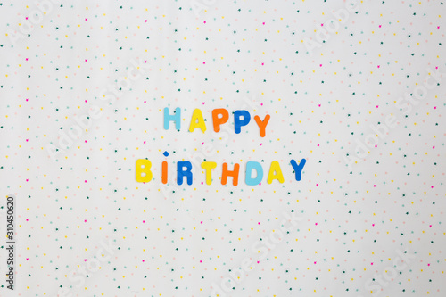 Colorful happy birthday wishes with stars on white background , space for text