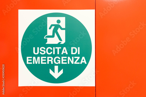 Uscita di emergenza, sign on a wall, in Italian