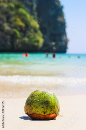 Fototapeta Naklejka Na Ścianę i Meble -  coconut on the tropical beach 