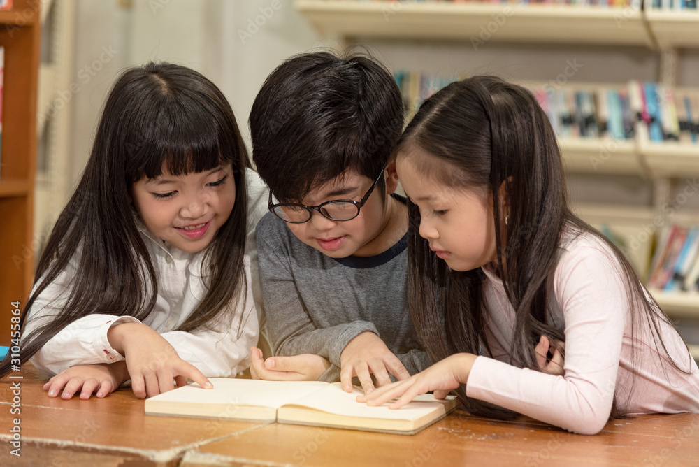 Education image,asian children happy learning in library at school. Education image,asian children happy learning in library at school.