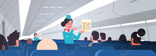 stewardess explaining for passengers instructions card female flight attendants safety demonstration concept modern airplane board interior horizontal portrait vector illustration