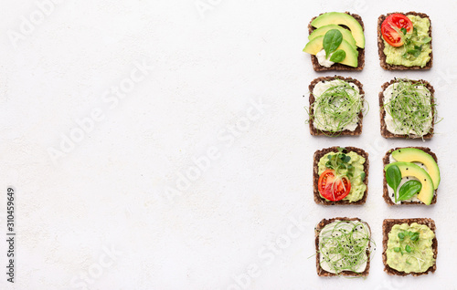 Sandwiches with avocado, tofu cheese and microgreen
