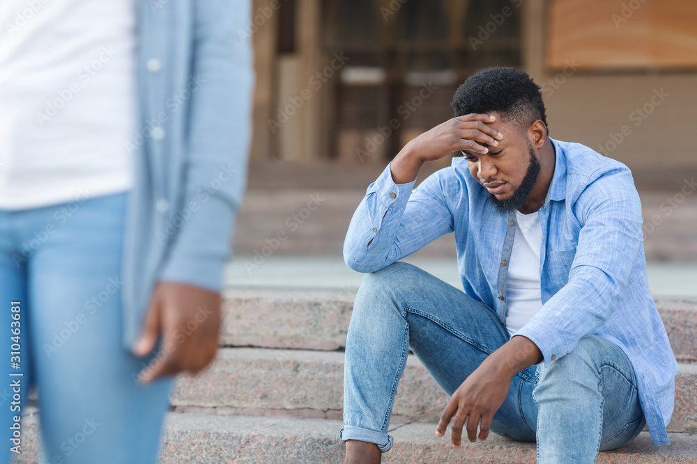 Black Couple Breaking Up After Argument. Girlfriend Leaving Her Sad Boyfriend. Black Couple Breaking Up After Argument. Girlfriend Leaving Her Sad Boyfriend.