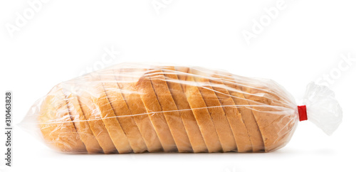 Sliced loaf of bread in a package on a white background. Isolated