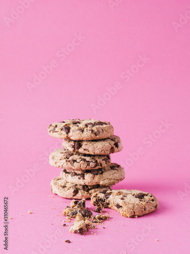 chocolate chips isolated on pink background